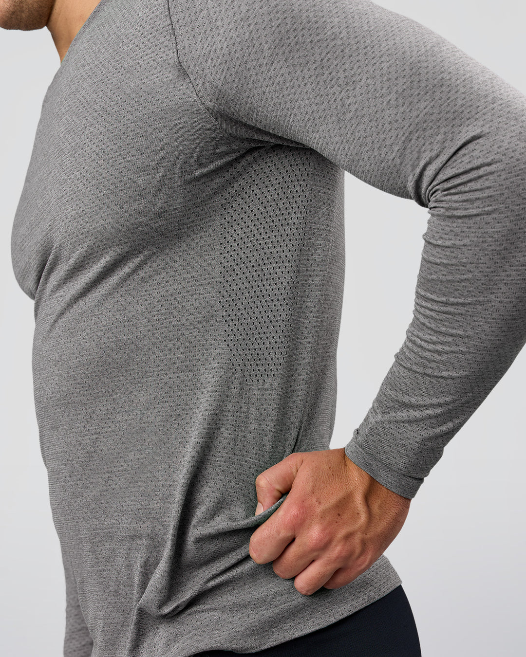 Man wearing AeroFLX+ Seamless Long Sleeve Tee (Set in Sleeve) - Dark Storm/Alloy | Model:Jaiden | Size:L - view 6