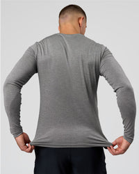 Man wearing AeroFLX+ Seamless Long Sleeve Tee (Set in Sleeve) - Dark Storm/Alloy | Model:Jaiden | Size:L | Thumbnail Index: 7