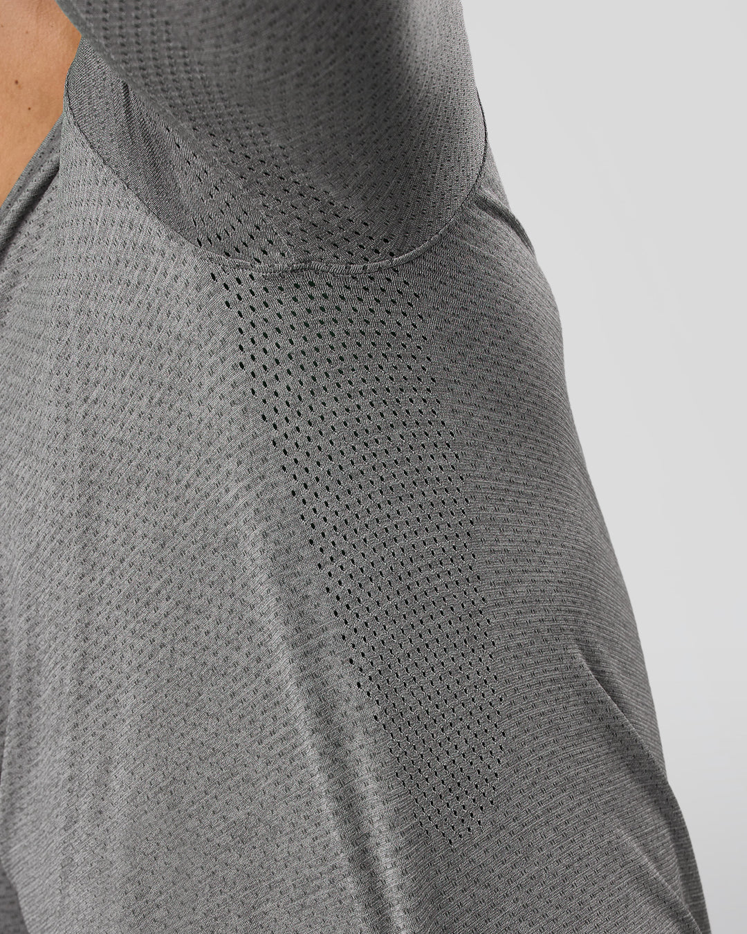 Man wearing AeroFLX+ Seamless Long Sleeve Tee (Set in Sleeve) - Dark Storm/Alloy | Model:Jaiden | Size:L - view 11