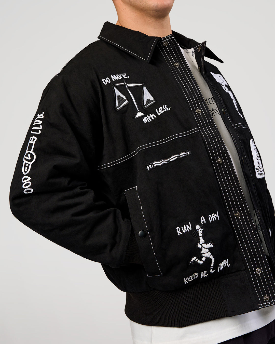 Man wearing Andrew J. Steel x LSKD Bomber Jacket - Black | Model:Jaiden | Size:L - view 9