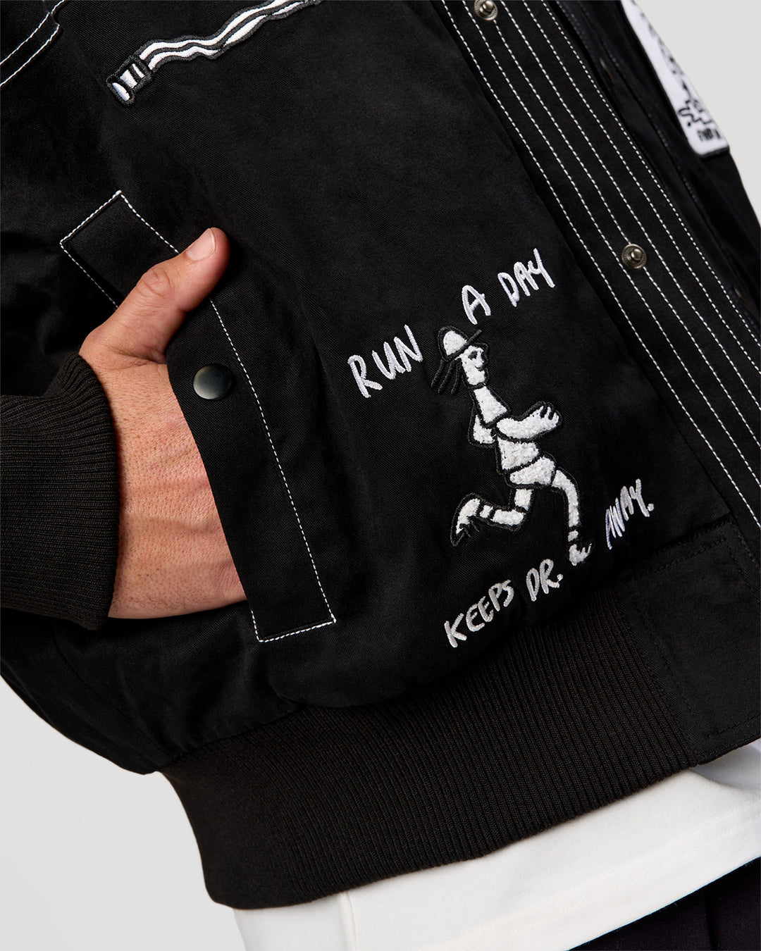 Man wearing Andrew J. Steel x LSKD Bomber Jacket - Black | Model:Jaiden | Size:L - view 11