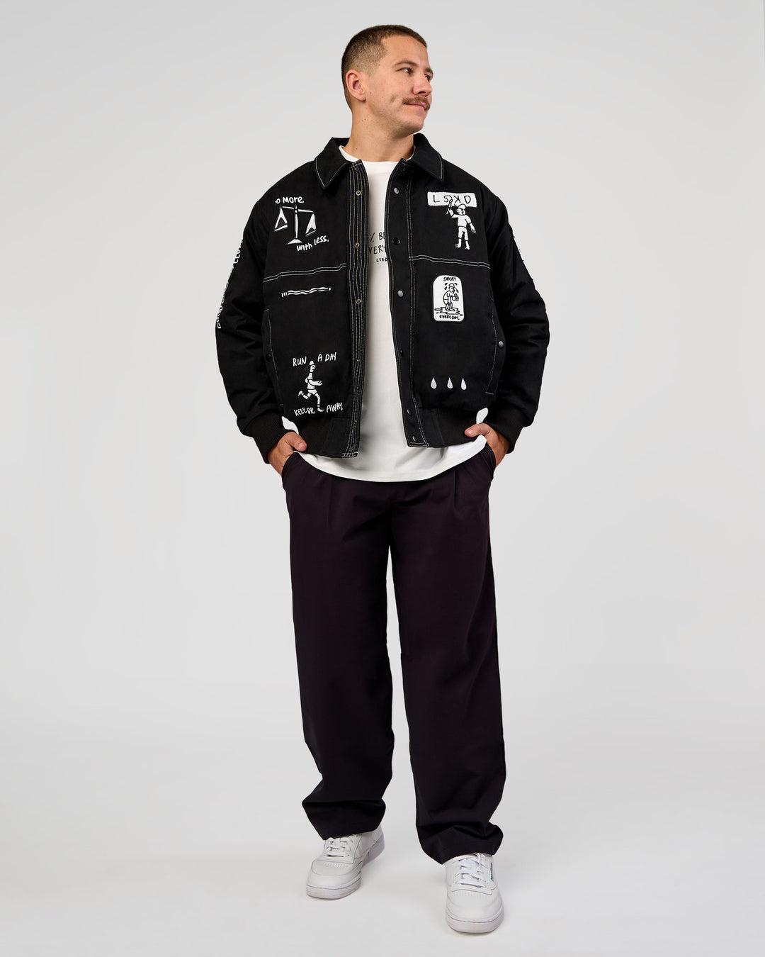 Man wearing Andrew J. Steel x LSKD Bomber Jacket - Black | Model:Jaiden | Size:L - view 16