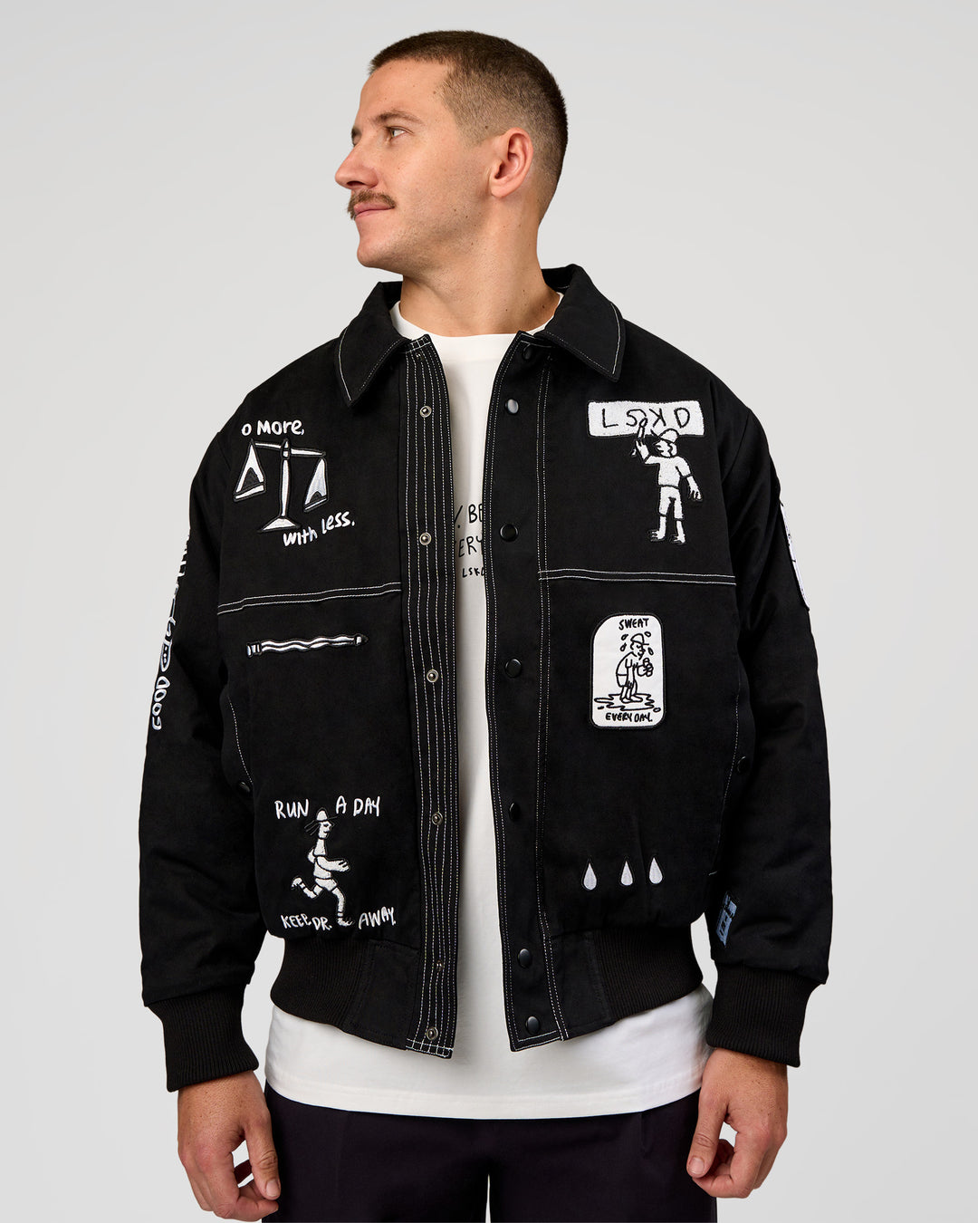 Man wearing Andrew J. Steel x LSKD Bomber Jacket - Black | Model:Jaiden | Size:L - view 5