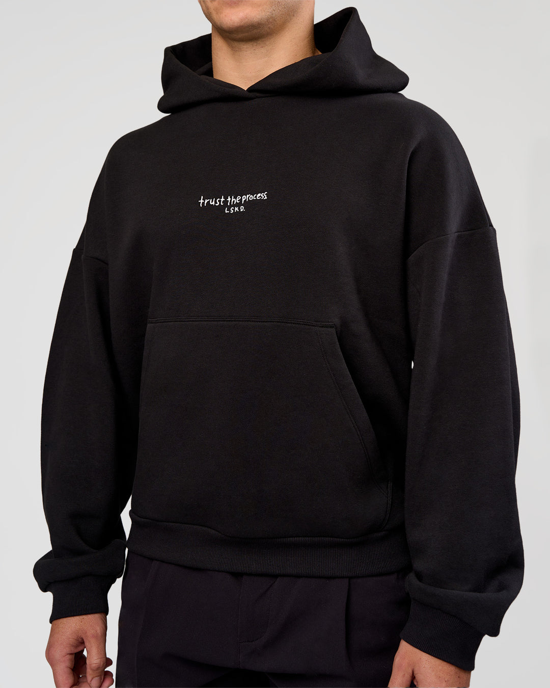 Man wearing Andrew J. Steel x LSKD Boxy Hoodie - Black | Model:Jaiden | Size:L - view 5
