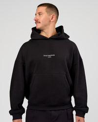 Man wearing Andrew J. Steel x LSKD Boxy Hoodie - Black | Model:Jaiden | Size:L | Thumbnail Index: 6