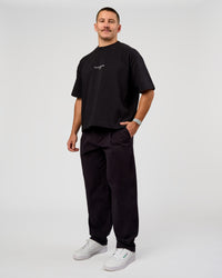 Man wearing Andrew J. Steel x LSKD Heavyweight Boxed Tee - Black | Model:Jaiden | Size:L | Thumbnail Index: 9