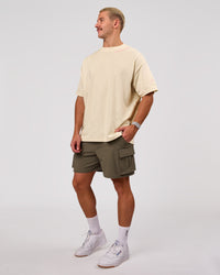 Man wearing Bree Heavyweight Oversized Tee - Vanilla Bean | Model:Jaiden | Size:L | Thumbnail Index: 5