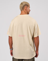 Man wearing Bree Heavyweight Oversized Tee - Vanilla Bean | Model:Jaiden | Size:L | Thumbnail Index: 2
