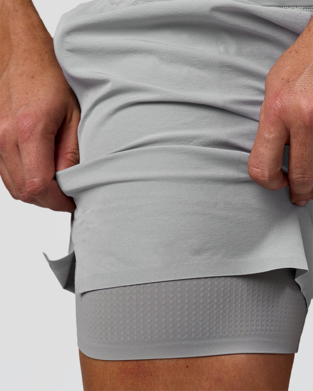 Man wearing Hybrid Lined 5" Short - Alloy | Model:Jaiden | Size:L - view 9