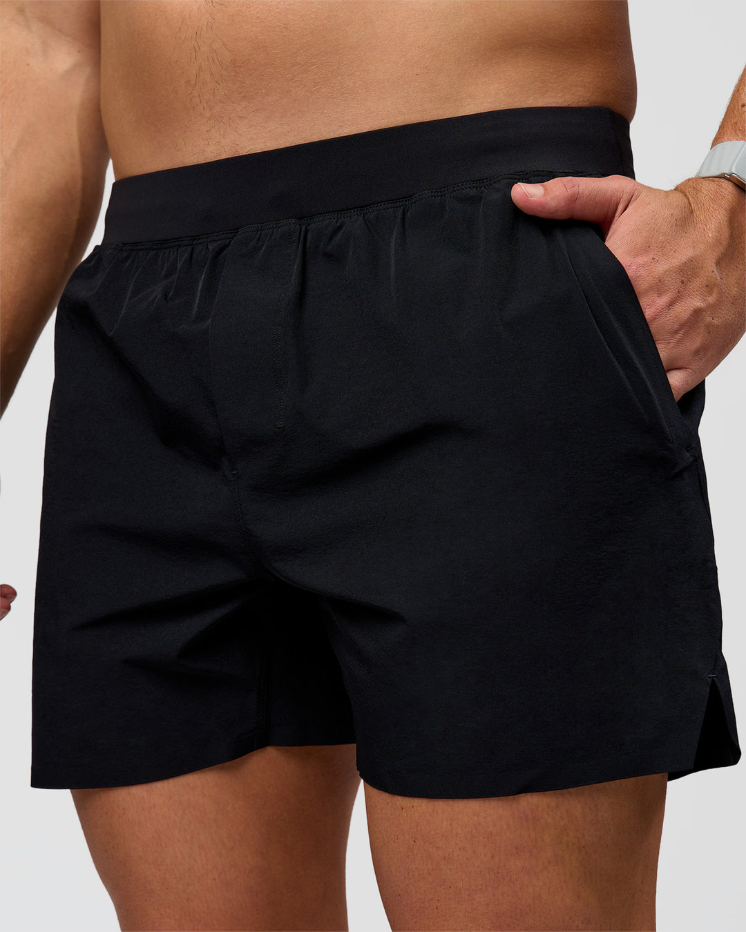 Man wearing Hybrid Lined 5" Short - Black-Reflective | Model:Jaiden | Size:L - view 1