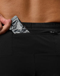 Man wearing Pace 5" Lined Ripstop Short - Black | Model:Jaiden | Size:L | Thumbnail Index: 2