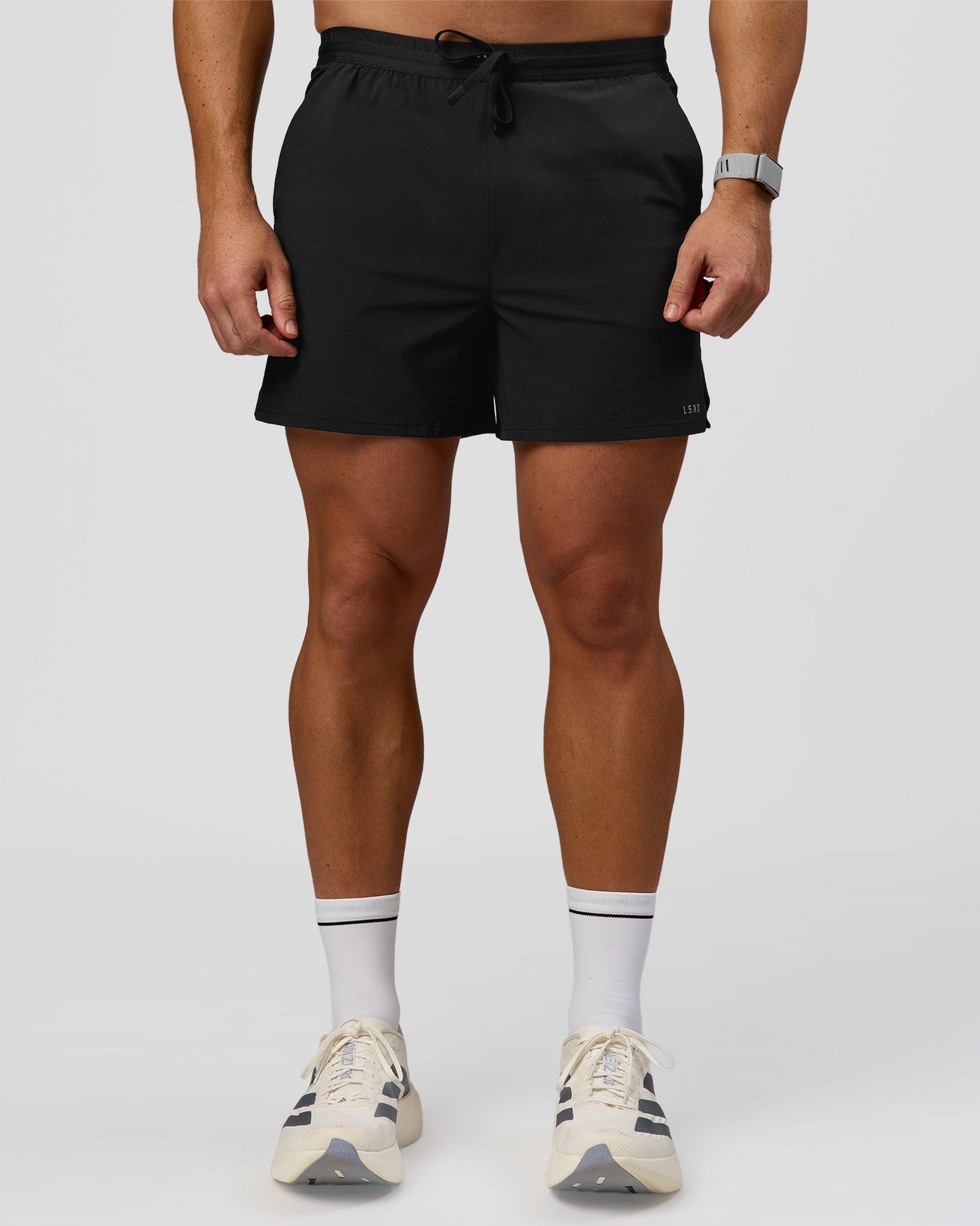 Man wearing Pace 5" Lined Ripstop Short - Black | Model:Jaiden | Size:L