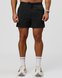 Man wearing Pace 5" Lined Ripstop Short - Black | Model:Jaiden | Size:L | Thumbnail Index: 1