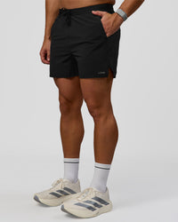 Man wearing Pace 5" Lined Ripstop Short - Black | Model:Jaiden | Size:L | Thumbnail Index: 6