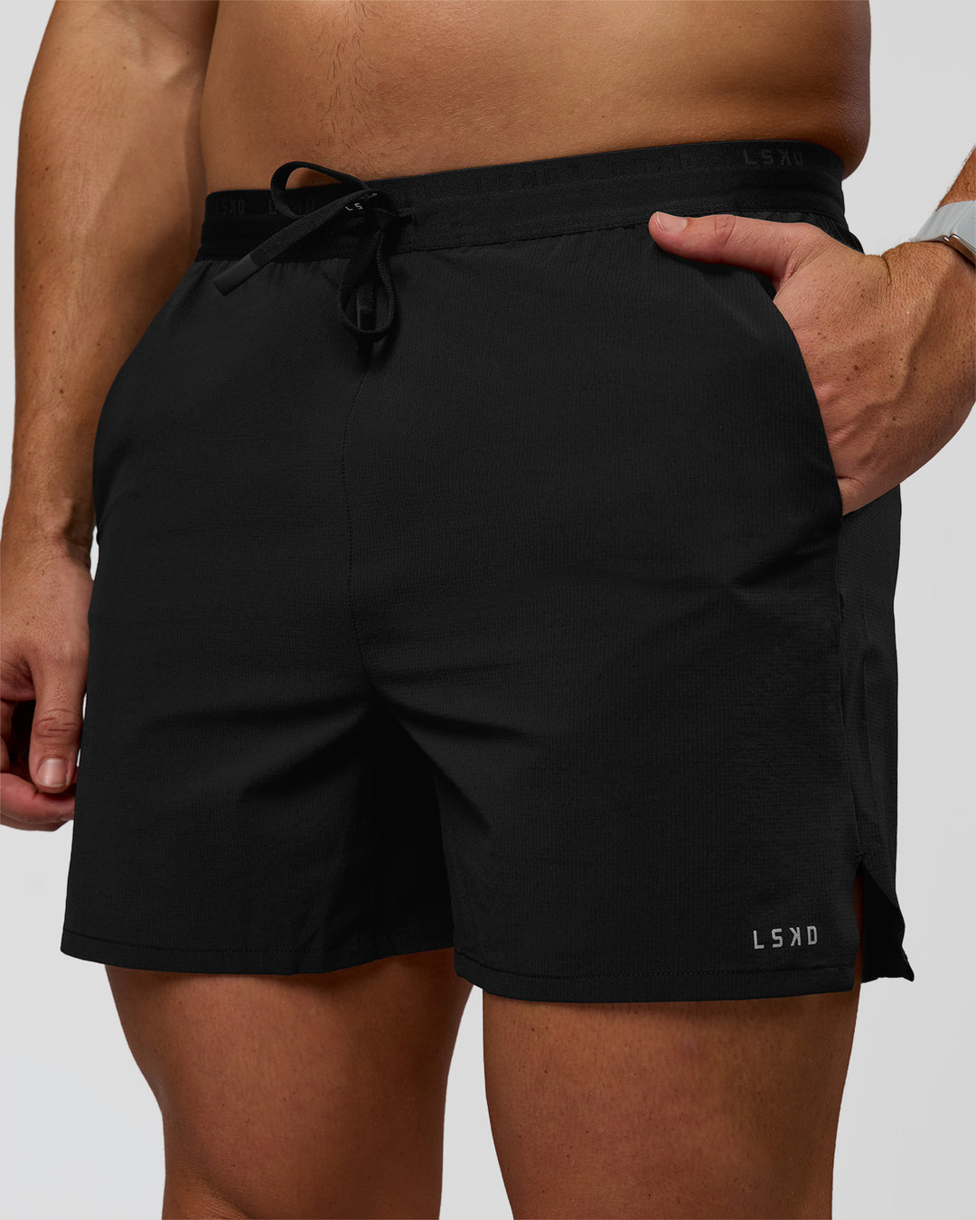 Man wearing Pace 5" Lined Ripstop Short - Black | Model:Jaiden | Size:L - view 1