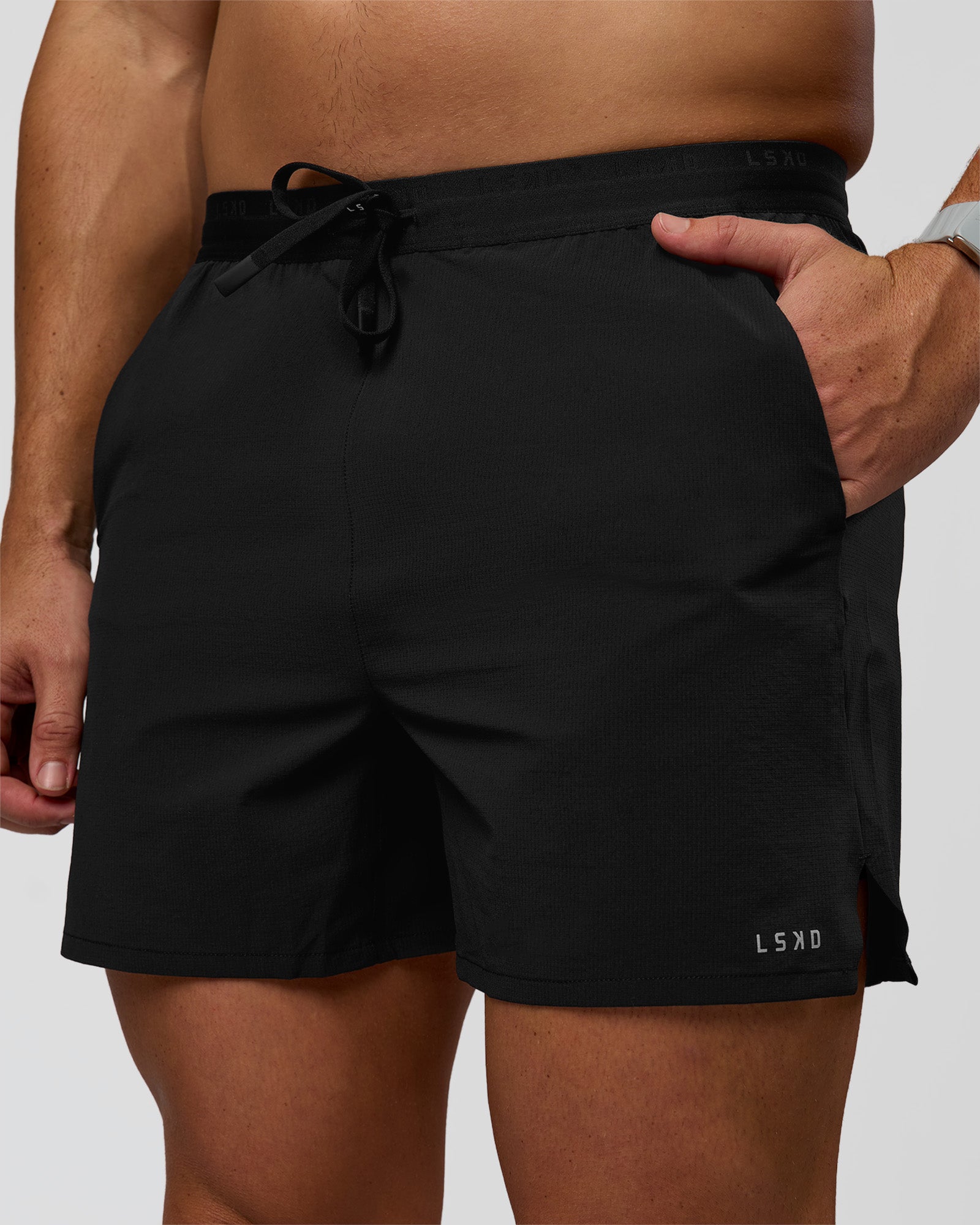Man wearing Pace 5" Lined Ripstop Short - Black | Model:Jaiden | Size:L