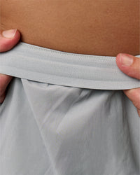 Man wearing Pace 5" Lined Running Short - Alloy | Model:Jaiden | Size:L | Thumbnail Index: 17