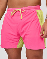 Man wearing UltraAir 5" Lined Performance Short - Sugar Plum-Lime Glo | Model:Jaiden | Size:L | Thumbnail Index: 0