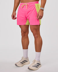 Man wearing UltraAir 5" Lined Performance Short - Sugar Plum-Lime Glo | Model:Jaiden | Size:L | Thumbnail Index: 1