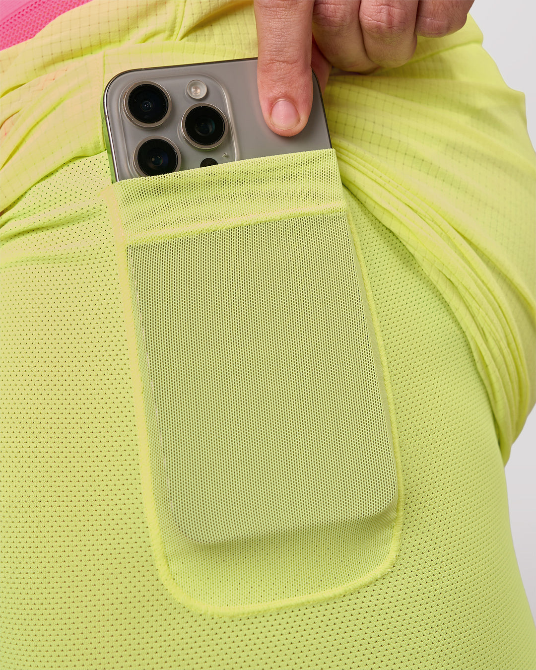 Man wearing UltraAir 5" Lined Performance Short - Sugar Plum-Lime Glo | Model:Jaiden | Size:L - view 8