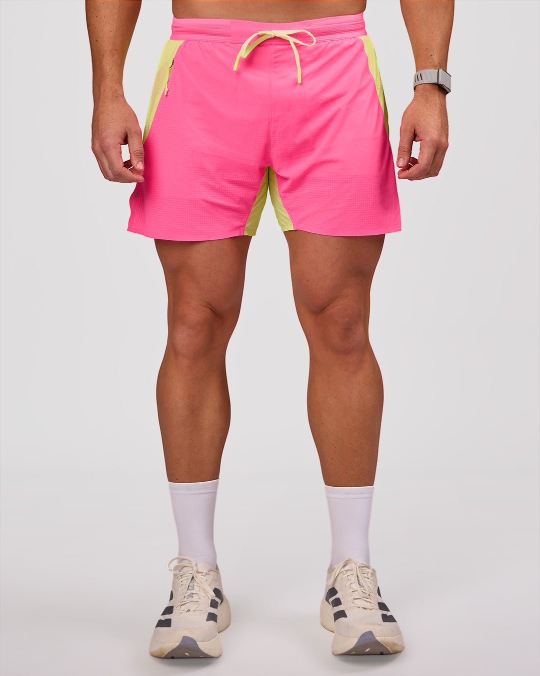 Man wearing UltraAir 5" Lined Performance Short - Sugar Plum-Lime Glo | Model:Jaiden | Size:L - view 4