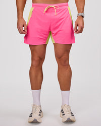 Man wearing UltraAir 5" Lined Performance Short - Sugar Plum-Lime Glo | Model:Jaiden | Size:L | Thumbnail Index: 3