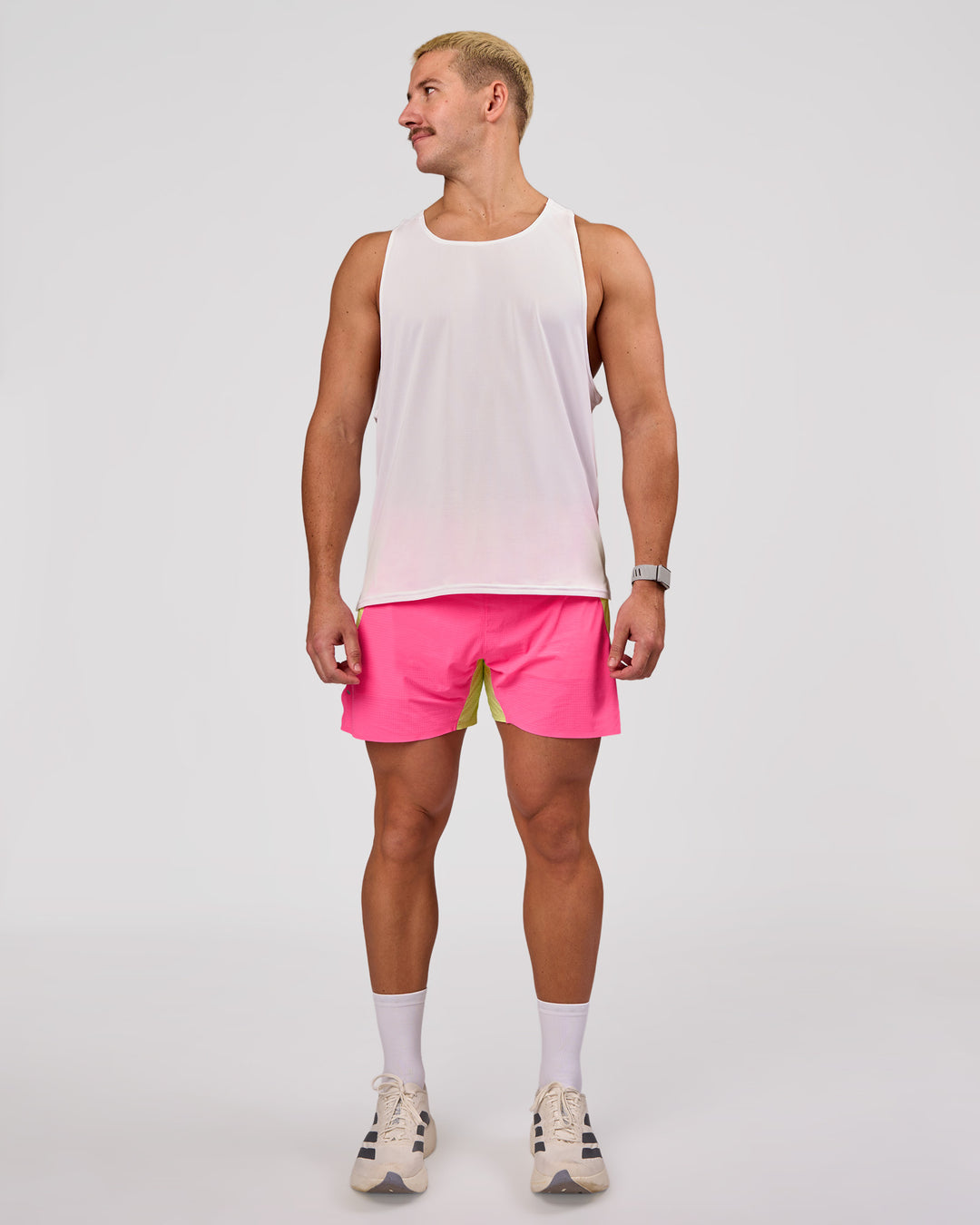 Man wearing UltraAir 5" Lined Performance Short - Sugar Plum-Lime Glo | Model:Jaiden | Size:L - view 6