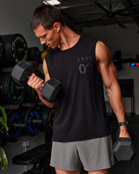 Man wearing Game Plan Rep Muscle Training Tank - Black-Onyx | Model:Liam | Size:L | Thumbnail Index: 0
