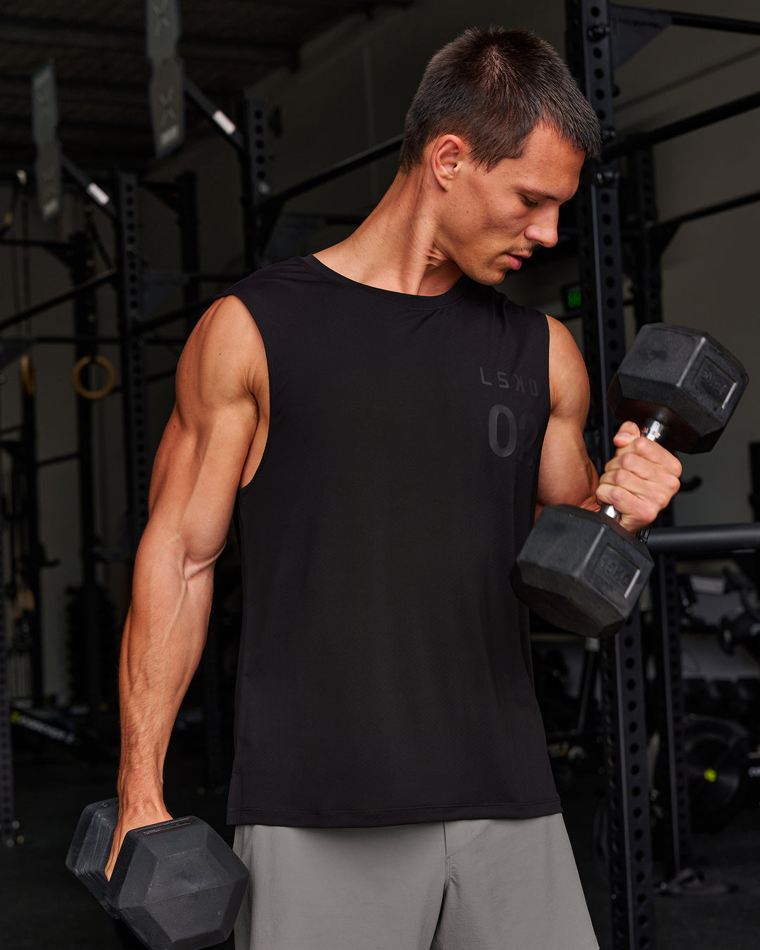Man wearing Game Plan Rep Muscle Training Tank - Black-Onyx | Model:Liam | Size:L - view 5