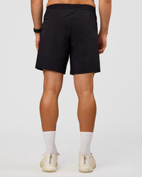 Man wearing Rep 7'' Training Short  - Black | Model:Liam | Size:L