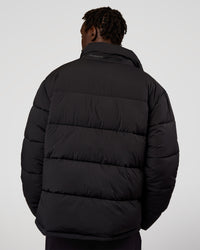 Man wearing Base Puffer Jacket - Black | Model:Okello | Size:L | Thumbnail Index: 2