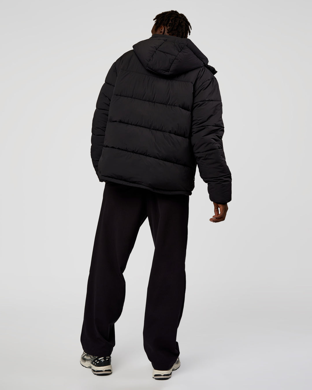 Man wearing Base Puffer Jacket - Black | Model:Okello | Size:L - view 4
