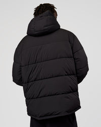 Man wearing Base Puffer Jacket - Black | Model:Okello | Size:L | Thumbnail Index: 4