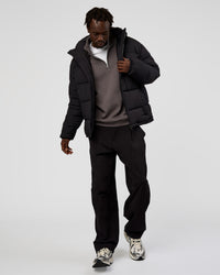 Man wearing Base Puffer Jacket - Black | Model:Okello | Size:L | Thumbnail Index: 6