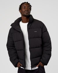 Man wearing Base Puffer Jacket - Black | Model:Okello | Size:L | Thumbnail Index: 9
