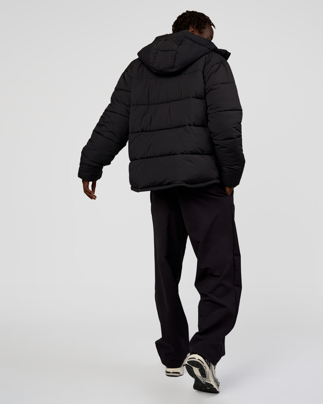 Man wearing Base Puffer Jacket - Black | Model:Okello | Size:L - view 11