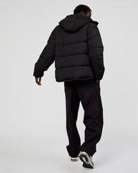 Man wearing Base Puffer Jacket - Black | Model:Okello | Size:L | Thumbnail Index: 10
