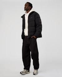 Man wearing Base Puffer Jacket - Black | Model:Okello | Size:L | Thumbnail Index: 13
