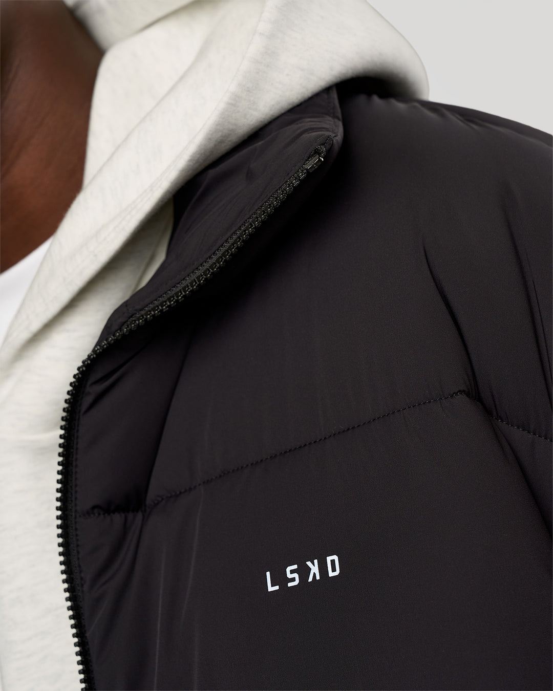 Man wearing Base Puffer Jacket - Black | Model:Okello | Size:L - view 15