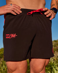 Man wearing Pace 5" Lined Running Short - Black-Scarlet | Model:Riley | Size:L | Thumbnail Index: 13