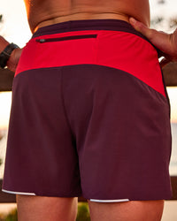 Man wearing Pace 5" Lined Running Short - Cherry Lacquer-Scarlet | Model:Riley | Size:L | Thumbnail Index: 2