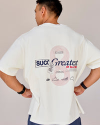 Man wearing Greatest of All Time Heavyweight FLXCotton Oversized Tee - Off White Washed-Scarlet | Model:Shane | Size:L | Thumbnail Index: 16