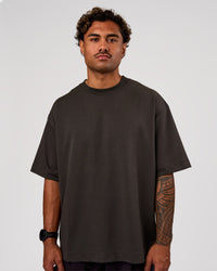 Man wearing AfterDark ZeroCrease Oversized Tee - Onyx | Model:Xav | Size:L | Thumbnail Index: 2