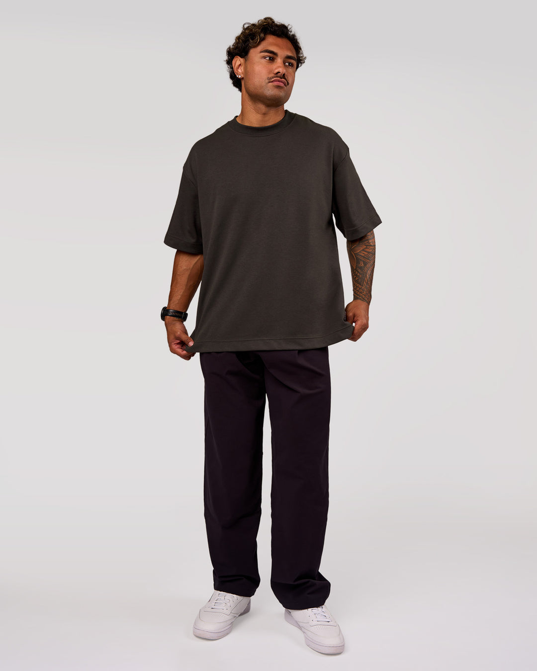 Man wearing AfterDark ZeroCrease Oversized Tee - Onyx | Model:Xav | Size:L - view 6