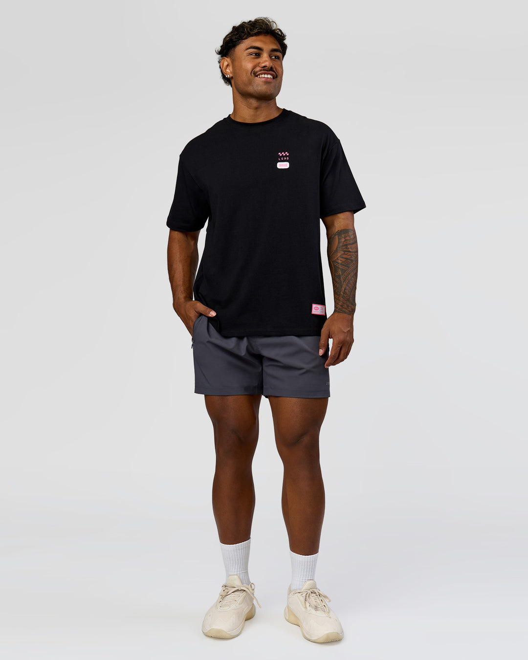 Man wearing Archive FLXCotton Oversized Tee - Black-Candy Pink | Model:Xav | Size:L - view 13