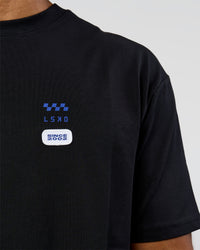 Man wearing Archive FLXCotton Oversized Tee - Black-Electric Indigo | Model:Xav | Size:L | Thumbnail Index: 9