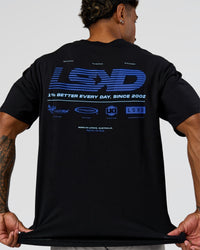Man wearing Archive FLXCotton Oversized Tee - Black-Electric Indigo | Model:Xav | Size:L | Thumbnail Index: 15
