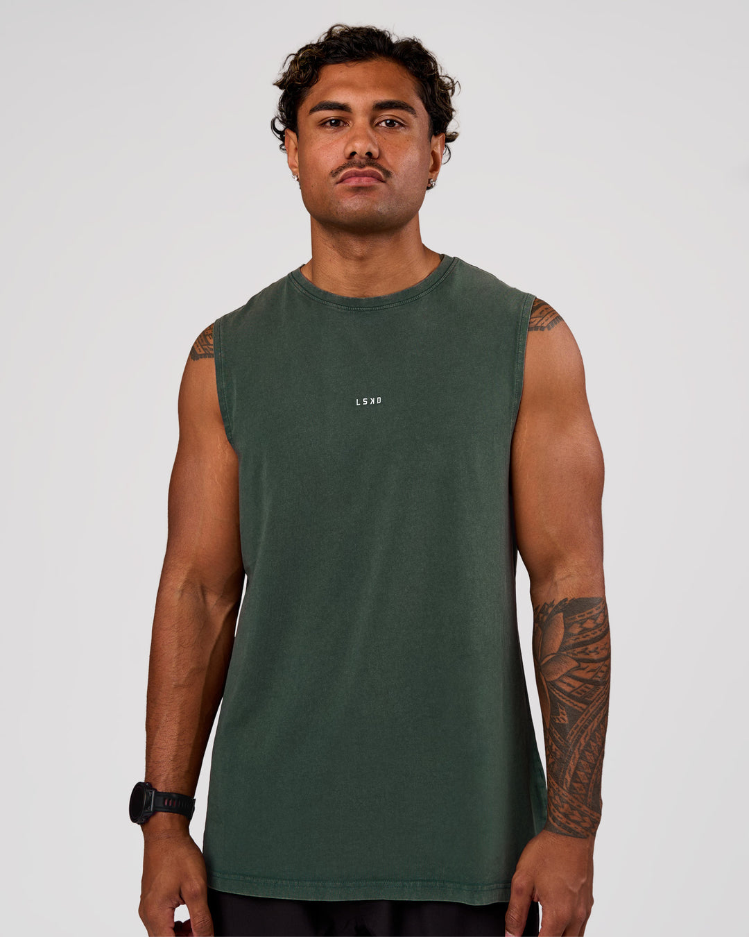 Man wearing Base FLXCotton Tank - Midnight Green Washed | Model:Xav | Size:L - view 1
