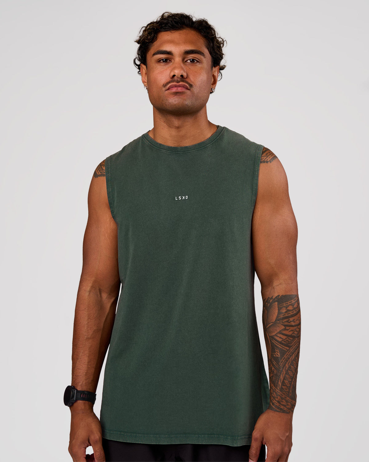 Man wearing Base FLXCotton Tank - Midnight Green Washed | Model:Xav | Size:L