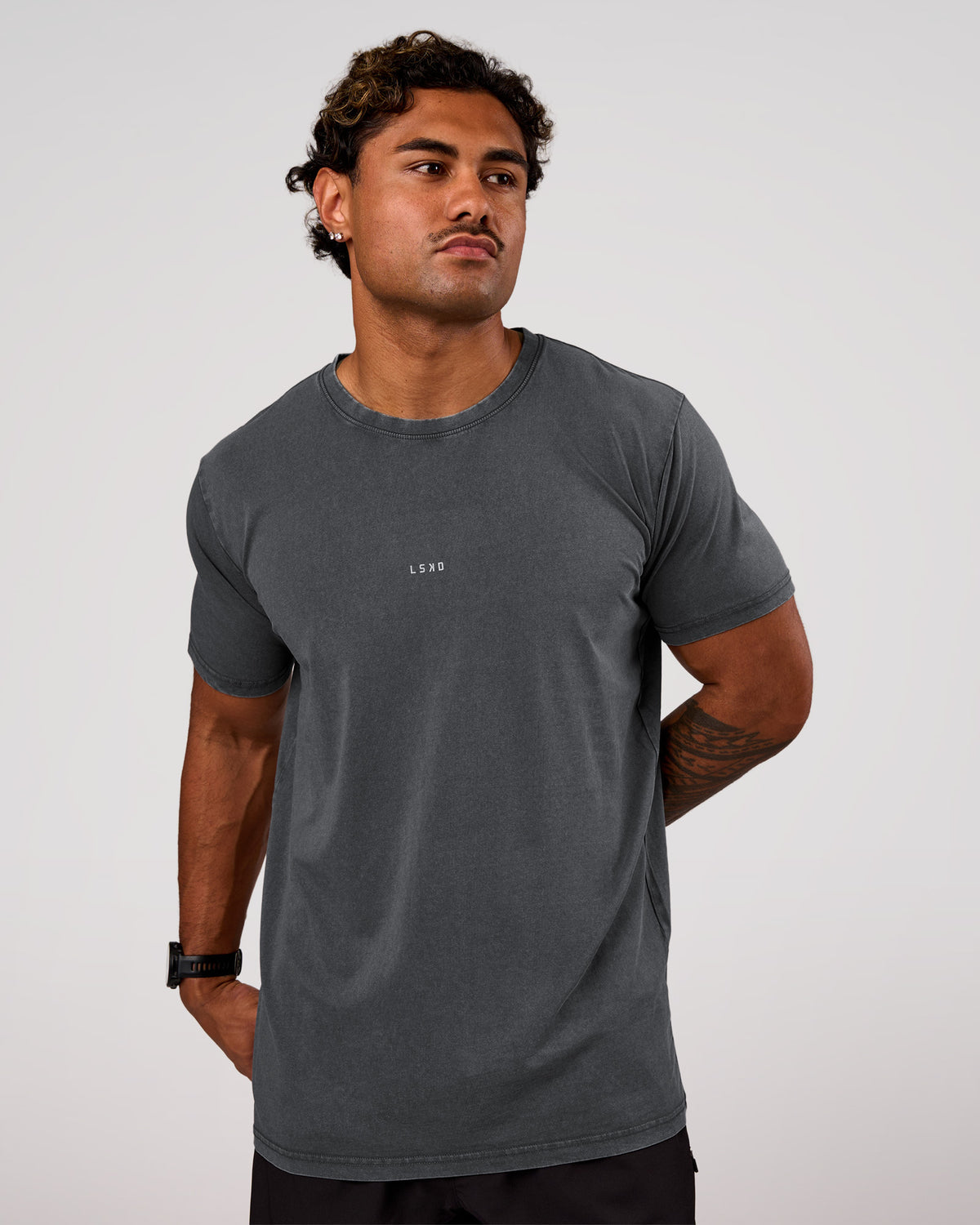 Man wearing Base FLXCotton Tee Oversized - Dark Storm Washed | Model:Xav | Size:L